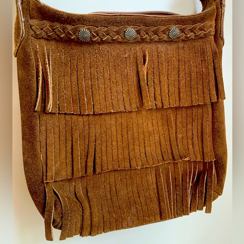 Leather handbag with fringe